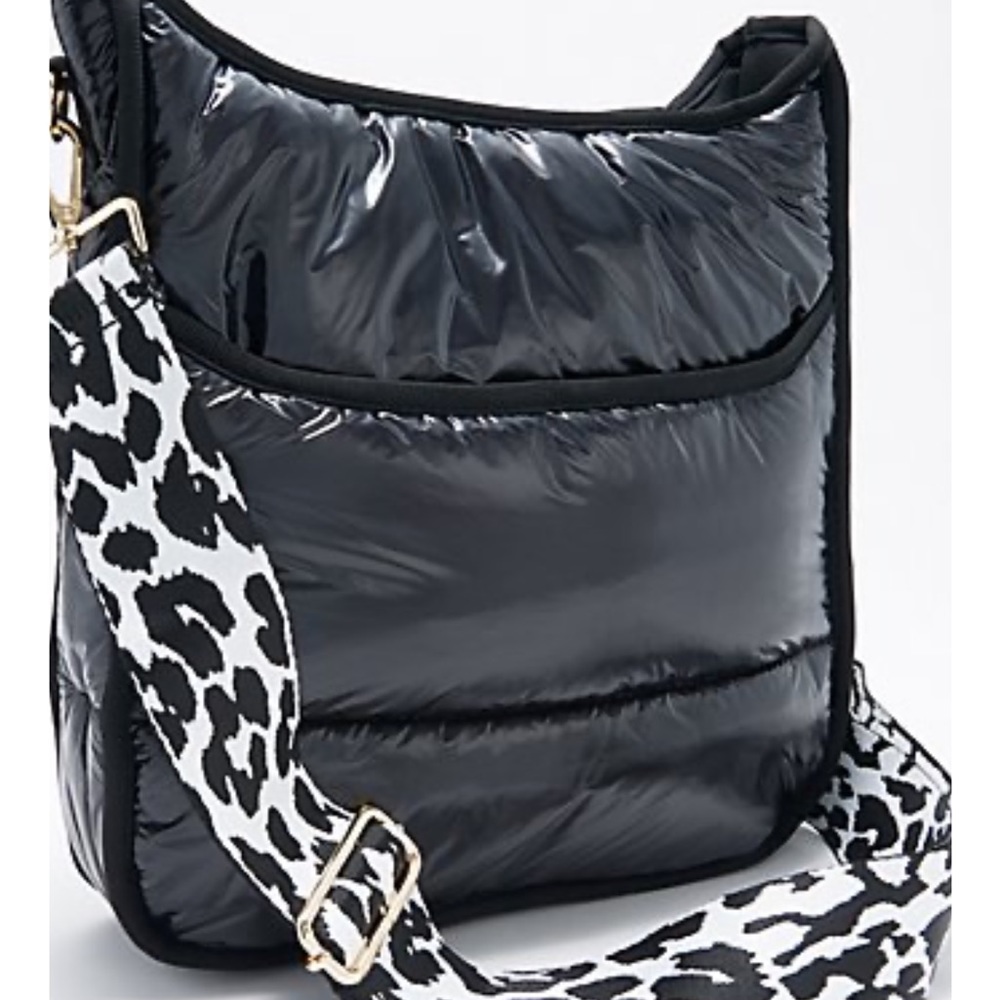 Ah-dorned black and white puffy quilted purse